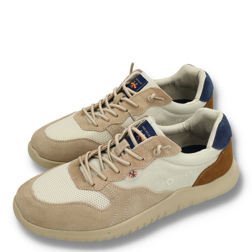 Zapatillas para hombre en tonos beige y kaki, combinando malla, gamuzado y cuero, diseño cómodo y casual de moda masculina premium.